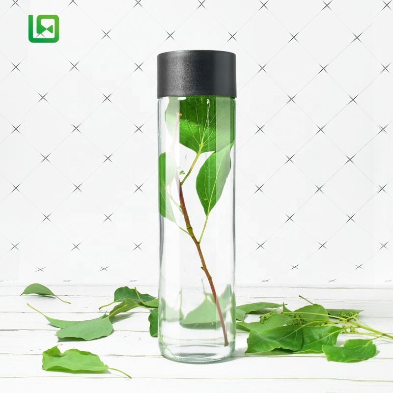 Wholesale 250ml 300ml 350ml 400ml 500ml 750ml 800ml clear round voss drinking glass water bottle with screw cover