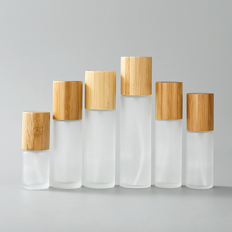 Wholesale 100ml Cosmetic Alcohol Bottles Bamboo Collar Frosted Glass Body Spray Bottles with Bamboo Pump Spray