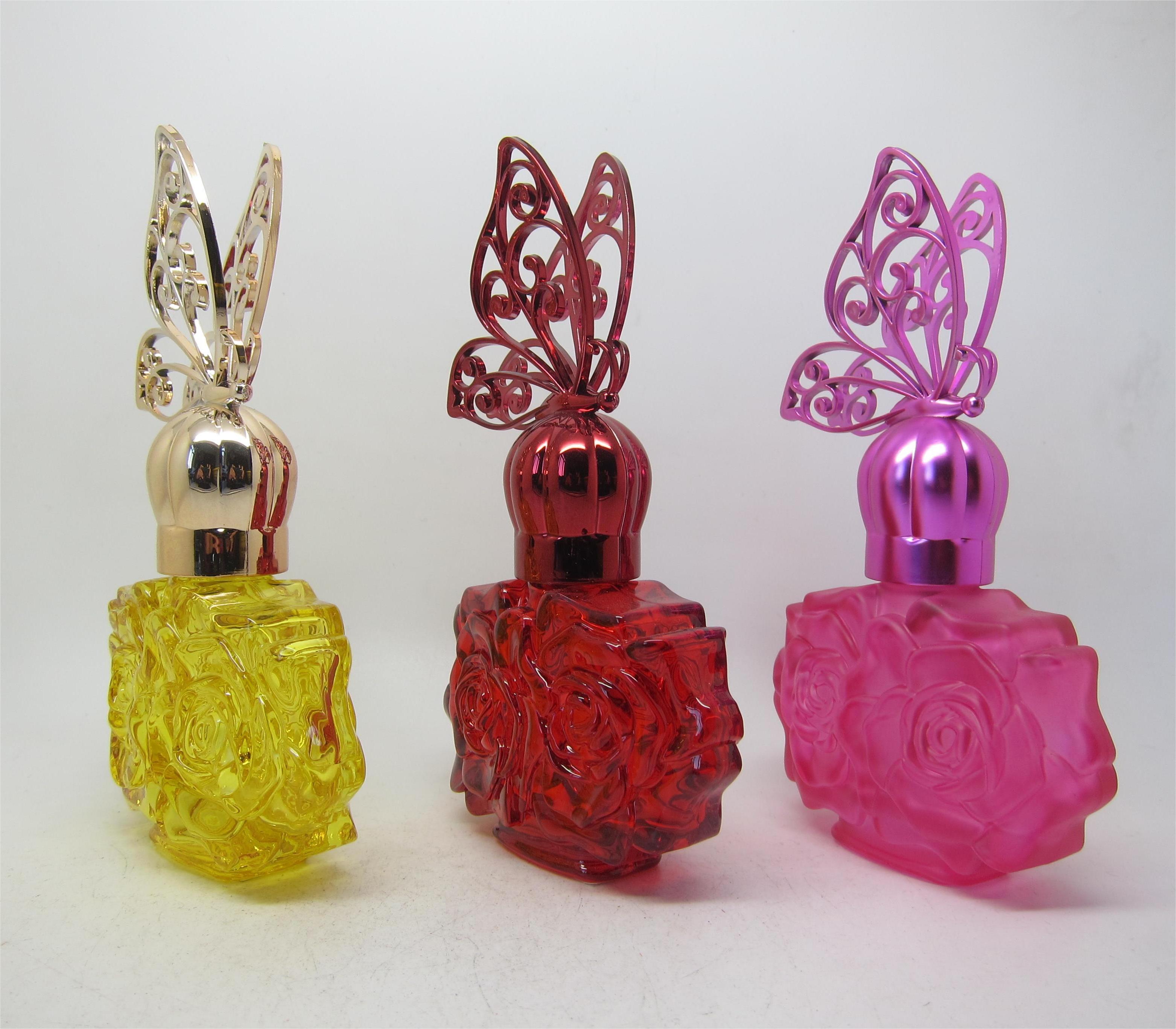 Luxury 50ml unique perfume empty yellow red pink flower glass bottle with golden red pink butterfly cap