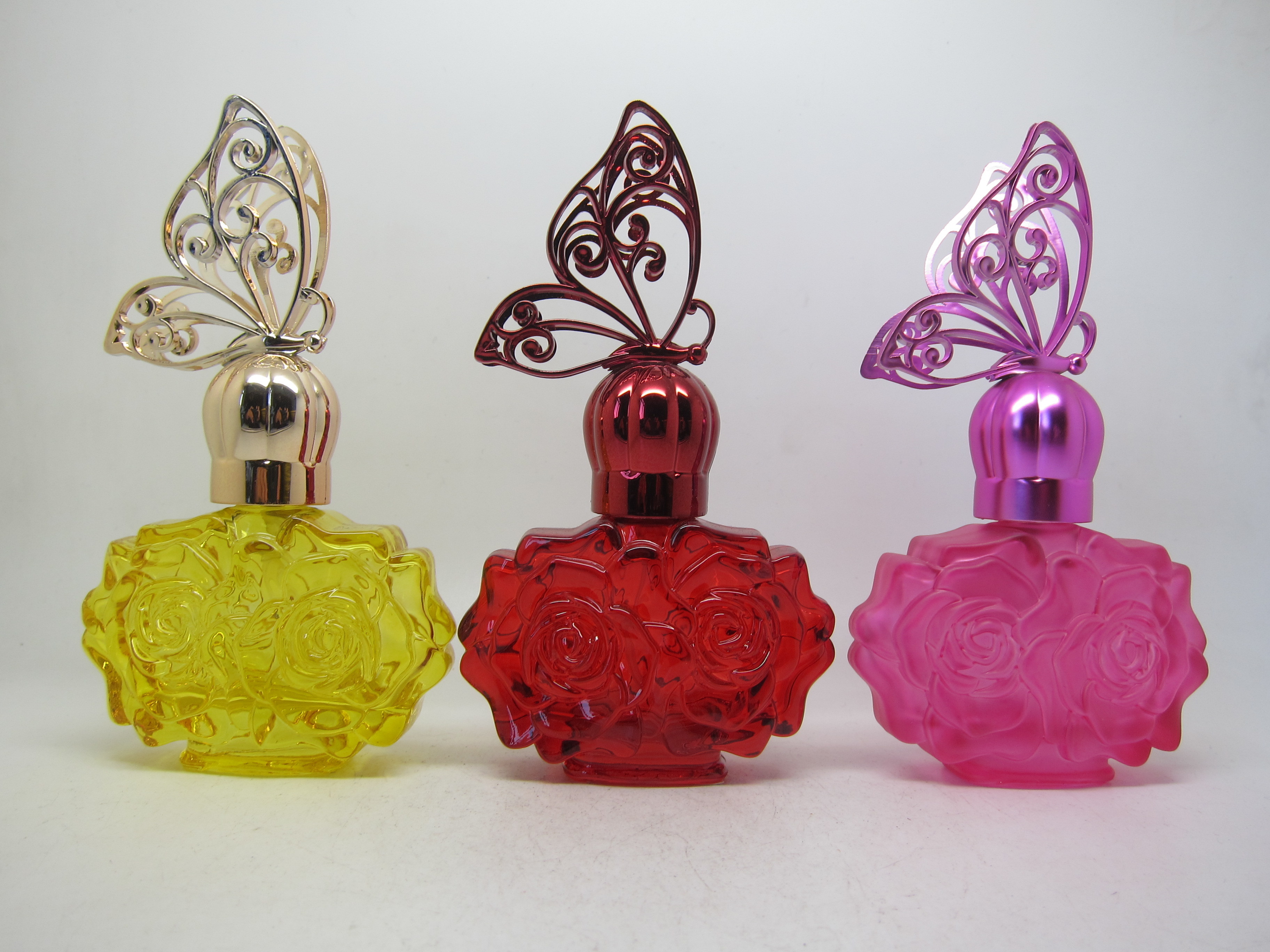 Luxury 50ml unique perfume empty yellow red pink flower glass bottle with golden red pink butterfly cap