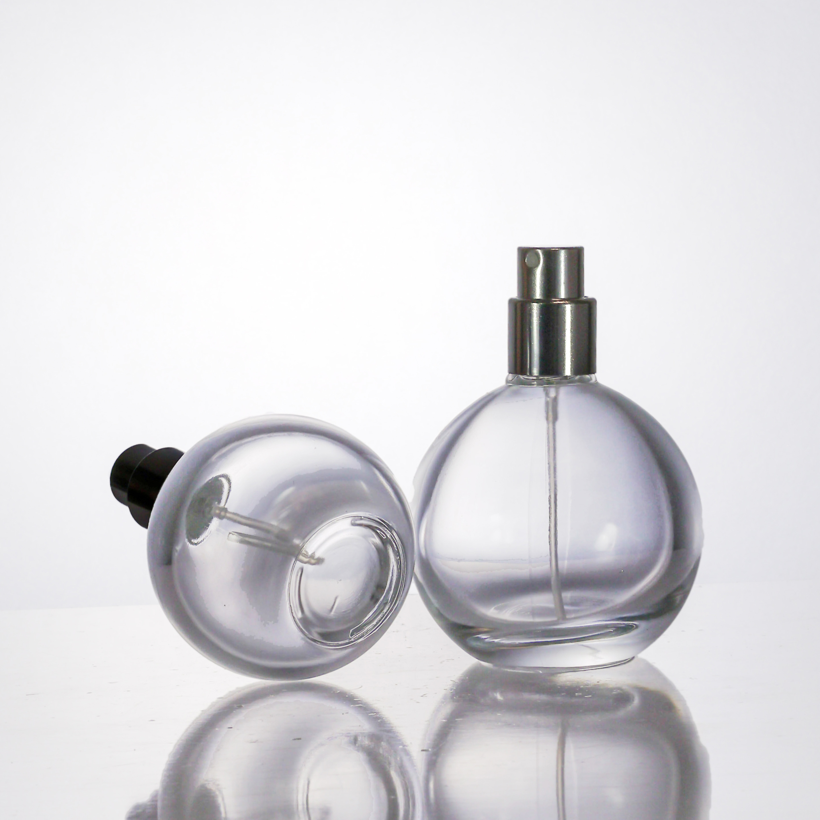 Unique Round Sphere Shaped Trigger Spray Bottle Luxury Modern Perfume Bottle with SPHERICAL CAP