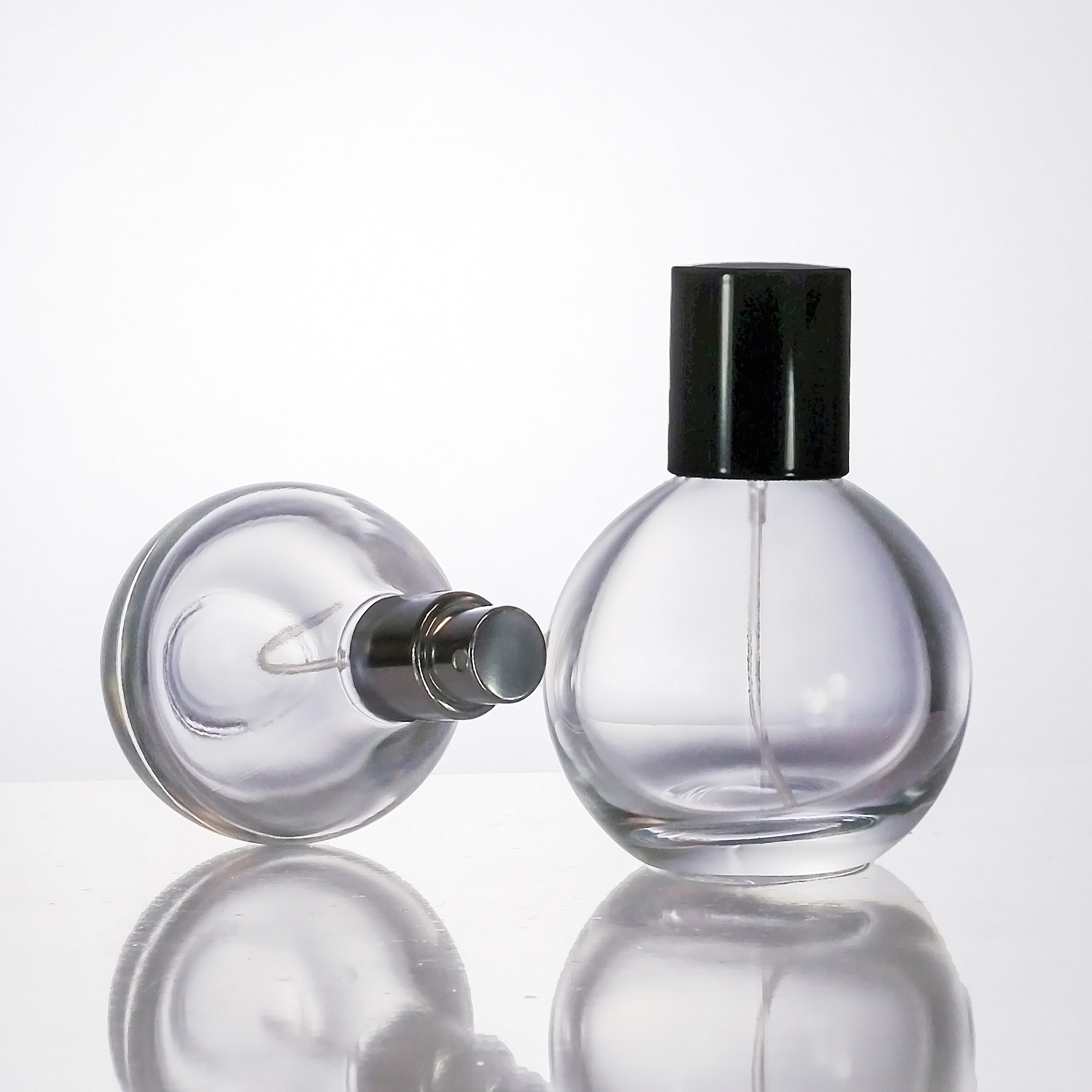 Unique Round Sphere Shaped Trigger Spray Bottle Luxury Modern Perfume Bottle with SPHERICAL CAP