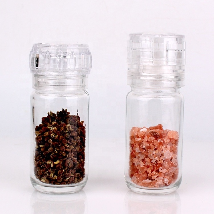 kitchen use wholesale manual 100ml 3oz round salt and pepper shaker grinder mill glass bottle for spice