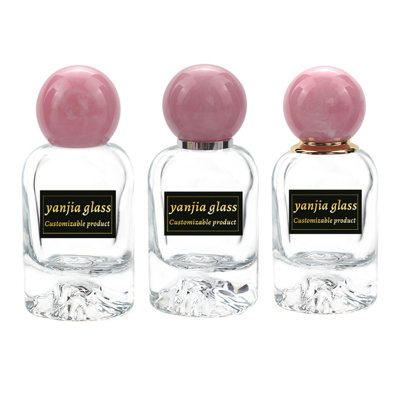 Custom Luxury Glass Fragrance Perfume Bottle Packaging 50ml Empty Perfume Bottle With Pink Ball Shape Lid