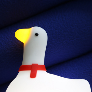 Creative new USB rechargeable children's bedroom with silicone night light swing goose night lamp