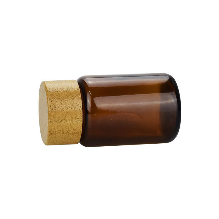 Vitamin Tablet Bottle Packaging 60ml 100ml 120ml 150ml 200ml 250ml Wide Mouth Amber Glass Capsule Bottle With Wooden Bamboo Lid