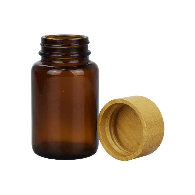 Vitamin Tablet Bottle Packaging 60ml 100ml 120ml 150ml 200ml 250ml Wide Mouth Amber Glass Capsule Bottle With Wooden Bamboo Lid