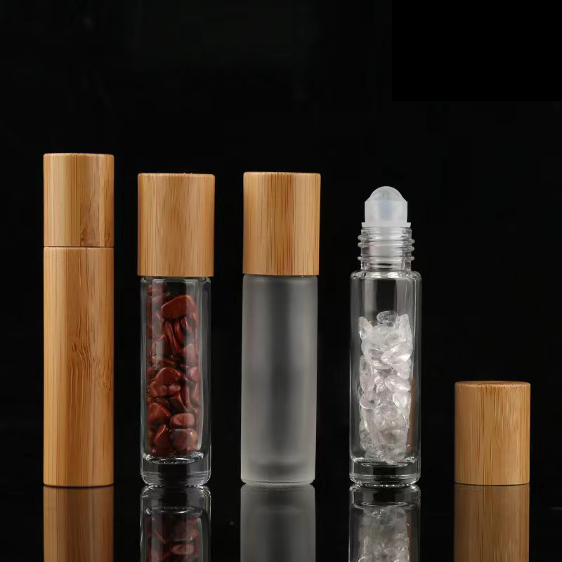 Wholesale New design wooden cap frosted glass roller bottle 10ml bamboo cosmetic packaging bottle