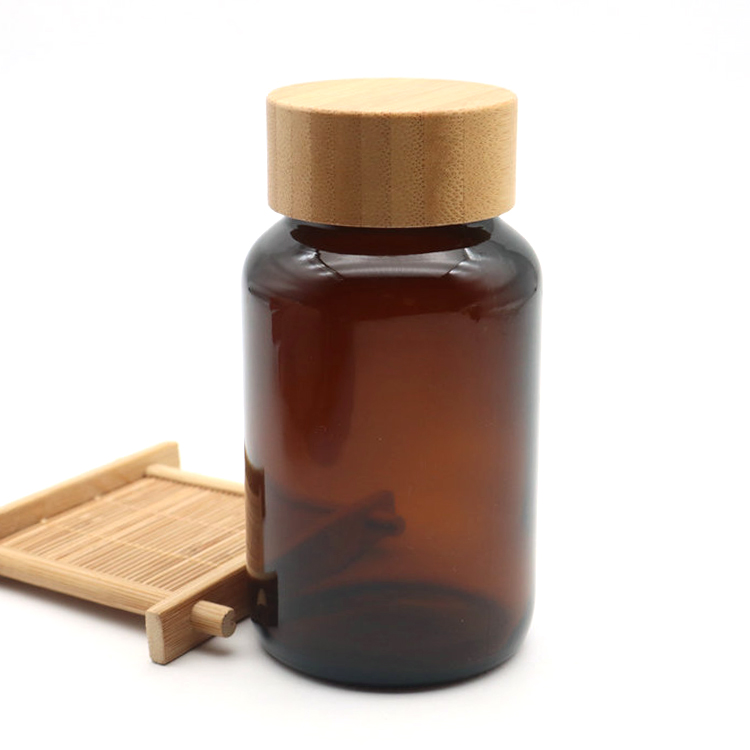 Vitamin Tablet Bottle Packaging 60ml 100ml 120ml 150ml 200ml 250ml Wide Mouth Amber Glass Capsule Bottle With Wooden Bamboo Lid