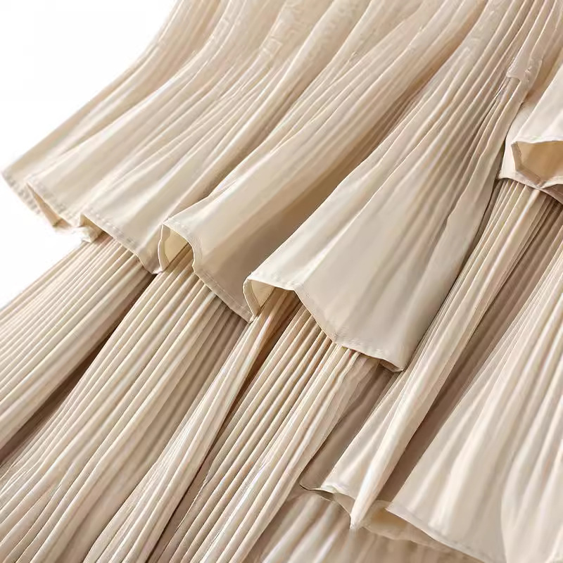 Autumn and winter Korean version of asymmetrical pleated cake skirt female pleated mid-length ruffled irregular skirt