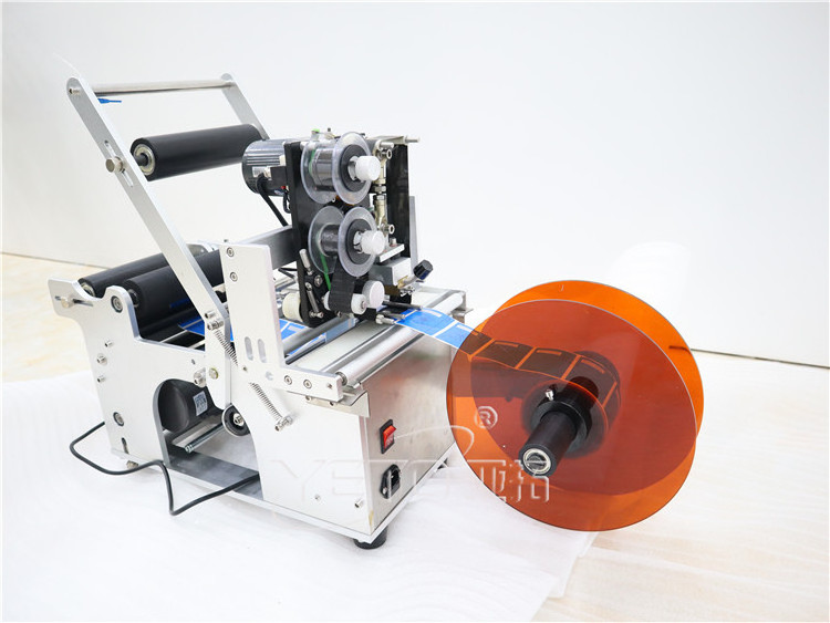 Cheap price manual 10ml vials small bottle labeling machine with date coding printer device