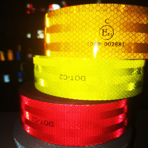 High conspicuity reflective tape with adhesive for vehicle truck