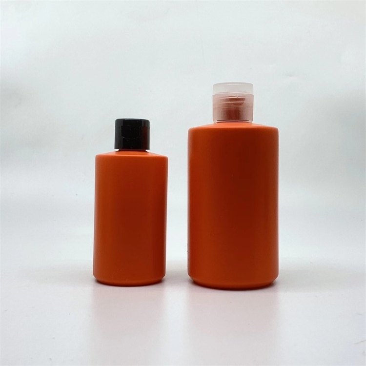 120ml plastic PE orange shampoo lotion bottle with flip top cap