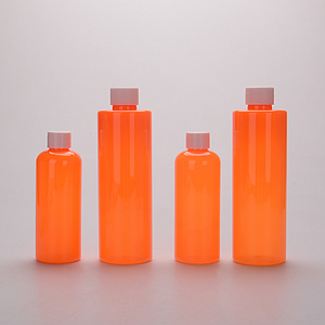 Wholesale 220ml 425ml Orange Pump Cap deliberate customized plastic bottle empty PET OEM Oval oil shampoo syrup Bottle