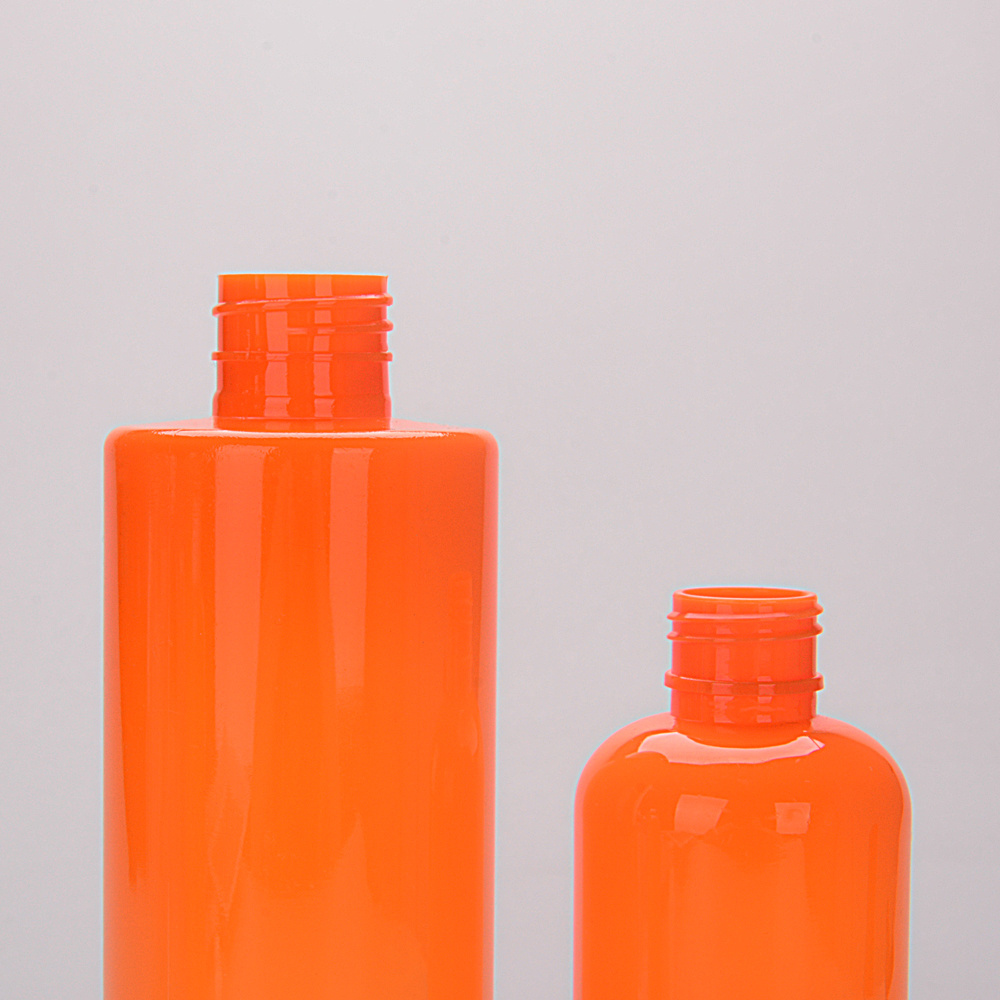 Wholesale 220ml 425ml Orange Pump Cap deliberate customized plastic bottle empty PET OEM Oval oil shampoo syrup Bottle