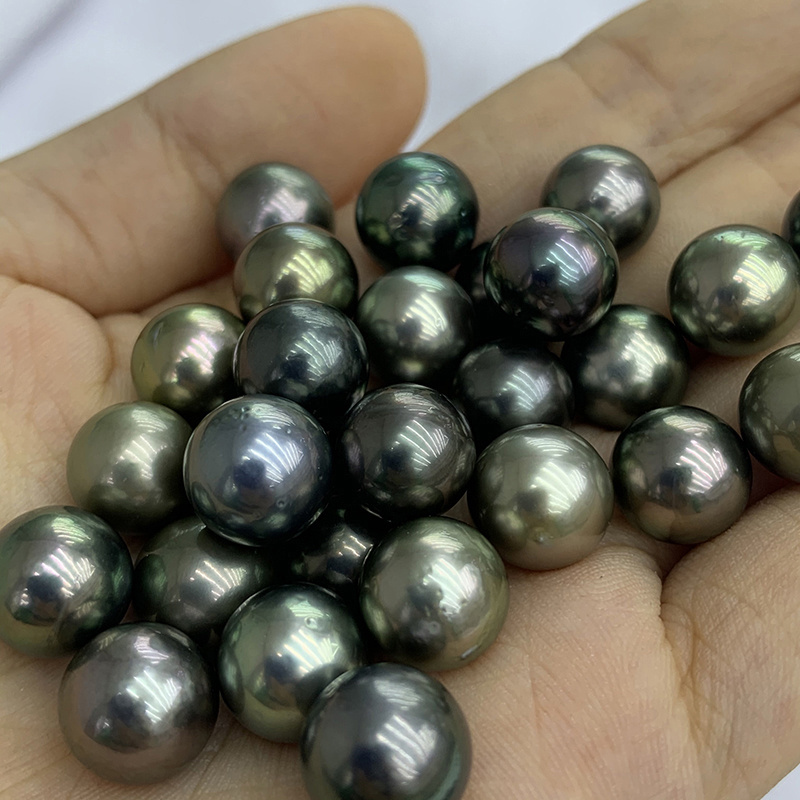 Grade Natural Real Genuine Seawater Peacock Black Round Loose Tahiti Sea Loose Pearl Price wholesale