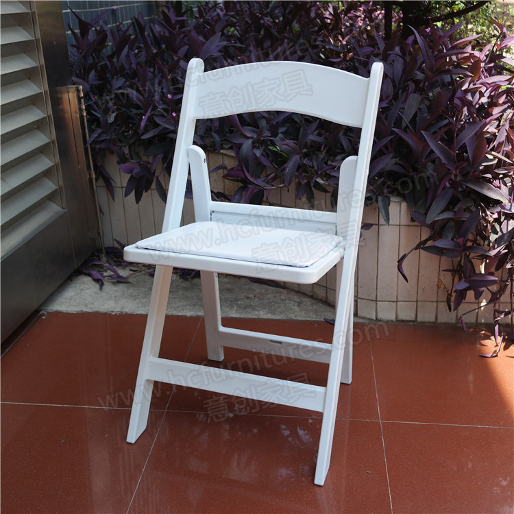 New design modern outdoor white foldable and stackable plastic resin fancy event wedding chairs