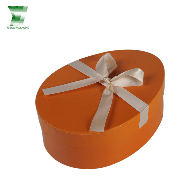 Lid and bottom cute small decorative oval packaging box for chocolate custom two pieces paperboard egg shaped box with ribbon