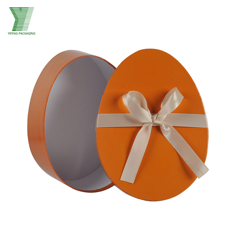 Lid and bottom cute small decorative oval packaging box for chocolate custom two pieces paperboard egg shaped box with ribbon