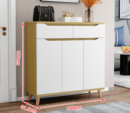 A shoe cabinet with doors and drawers for storage