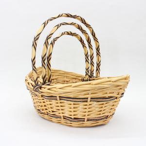 Caramel colored boat shaped handmade wicker woven flower basket storage basket