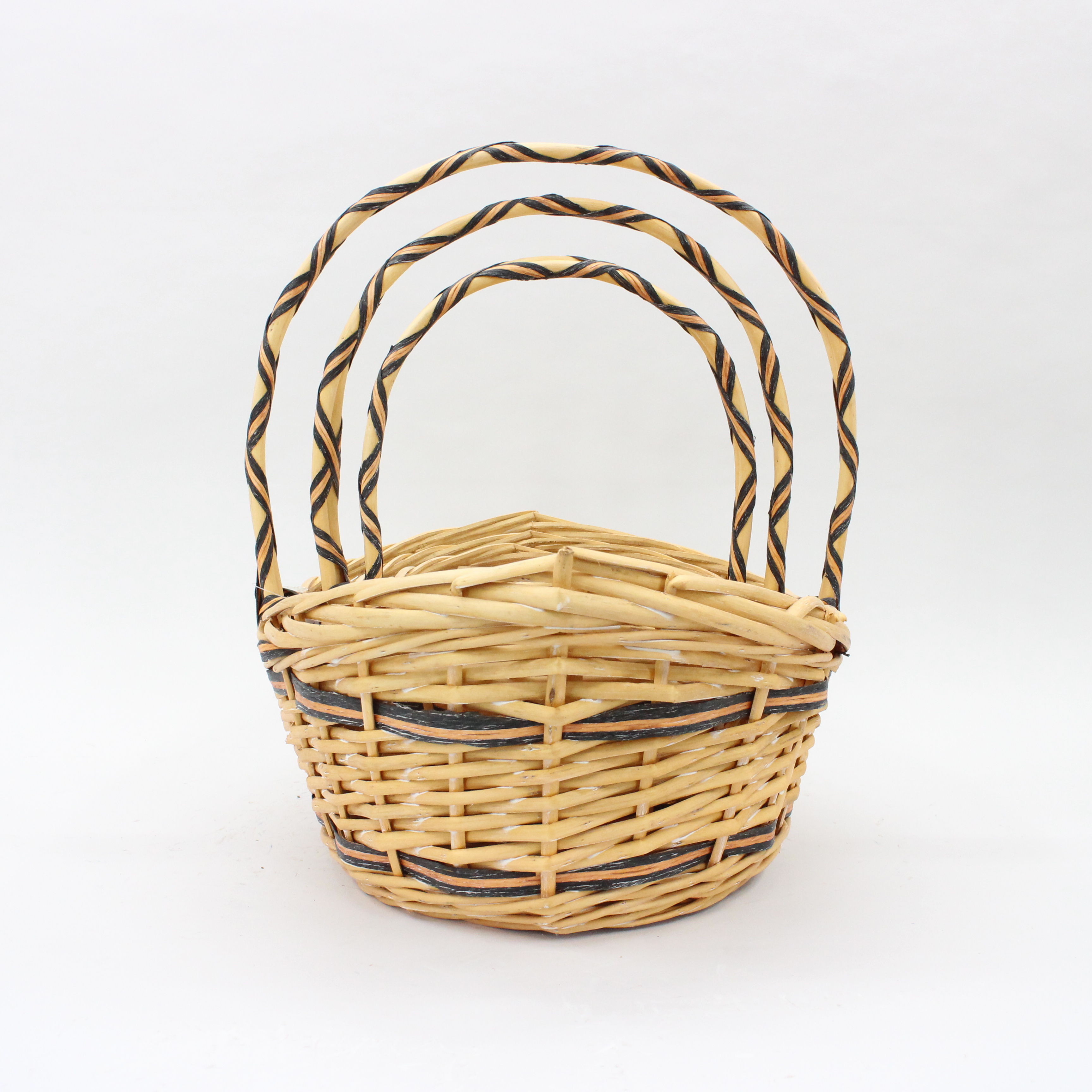 Caramel colored boat shaped handmade wicker woven flower basket storage basket