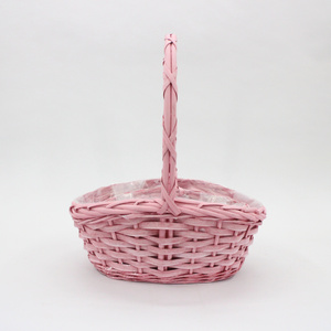 Cheap pink boat shaped high handle wicker flower basket handcrafted storage basket