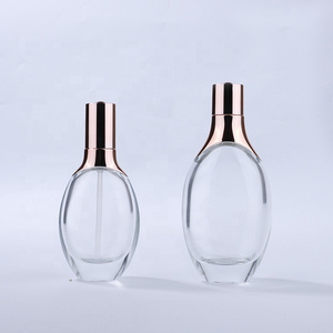 Lotion skin flat round clear bottle luxury 30ml 50ml 100ml glass bottle rose gold pump cosmetic