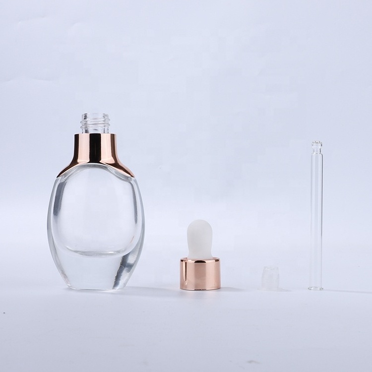 Lotion skin flat round clear bottle luxury 30ml 50ml 100ml glass bottle rose gold pump cosmetic