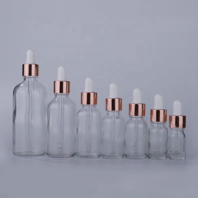 Wholesale classic serum 30ml clear glass dropper bottle with rose gold lid for essential oil