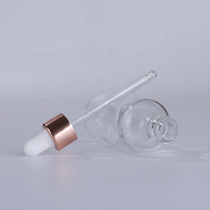 Wholesale classic serum 30ml clear glass dropper bottle with rose gold lid for essential oil