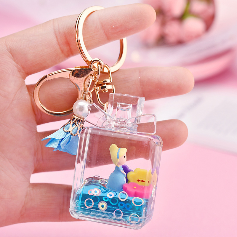 Personality Oil Acrylic Quicksand Pink Liquid Keychain Bowknot Perfume Bottle Floating Car Keyring Gift Bag Pendant