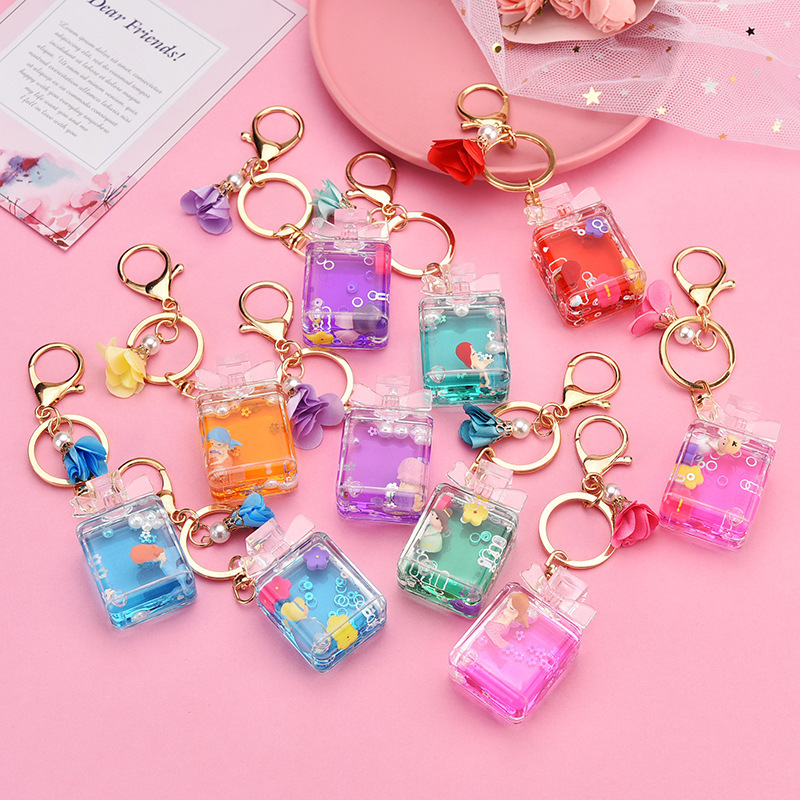 Personality Oil Acrylic Quicksand Pink Liquid Keychain Bowknot Perfume Bottle Floating Car Keyring Gift Bag Pendant