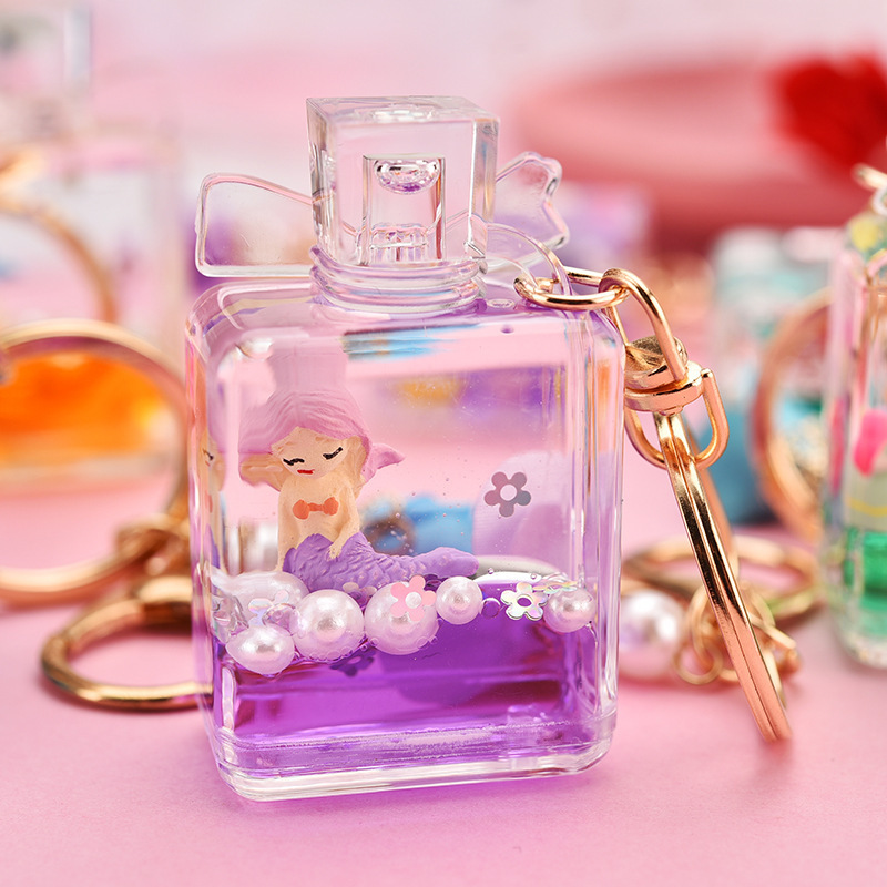 Personality Oil Acrylic Quicksand Pink Liquid Keychain Bowknot Perfume Bottle Floating Car Keyring Gift Bag Pendant