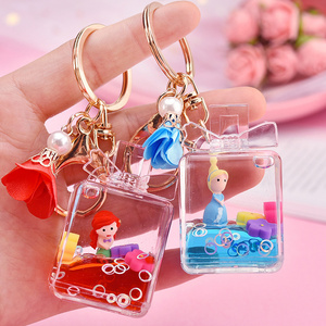 Personality Oil Acrylic Quicksand Pink Liquid Keychain Bowknot Perfume Bottle Floating Car Keyring Gift Bag Pendant