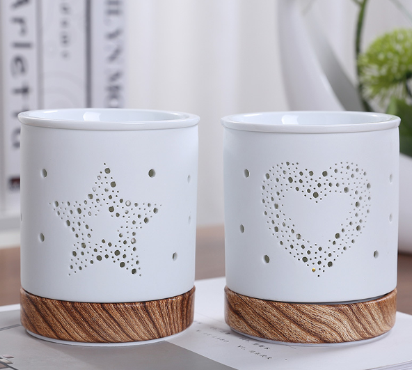 Ceramic Oil Burner wholesaler Hollow Round Tea Light Candle Holder Essential Oil Warmer Decoration for Living Room