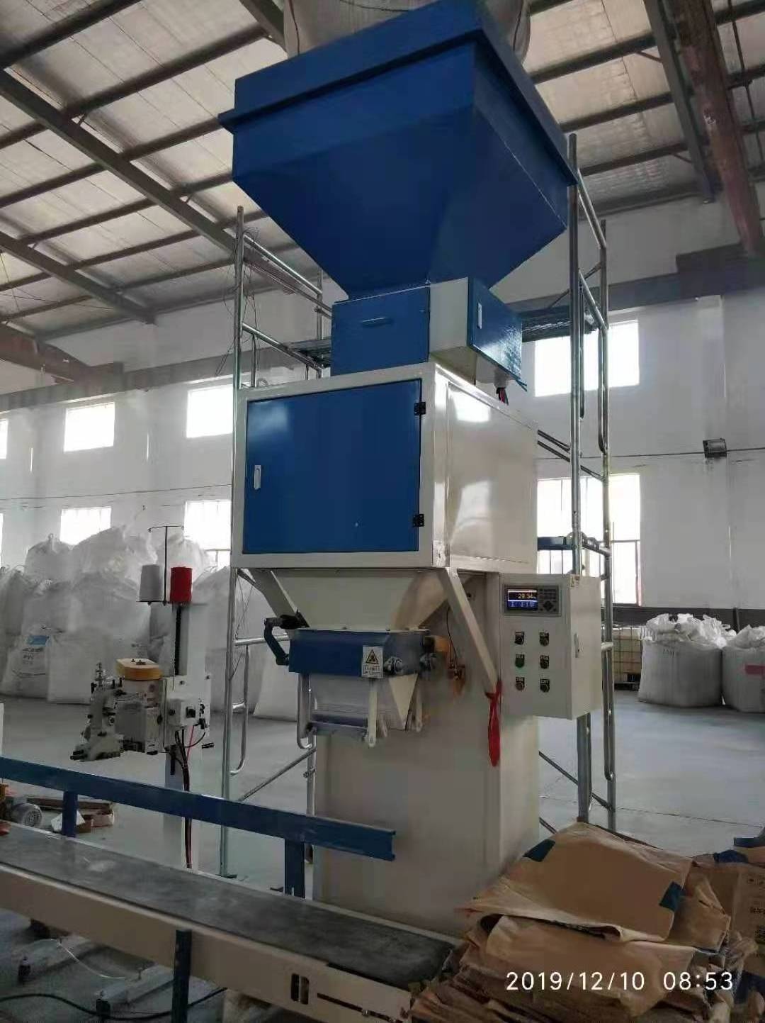 Full automatic packing machine flour rice sugar candy powder feed food pellet packing machine 50kg vacuum packing machine price