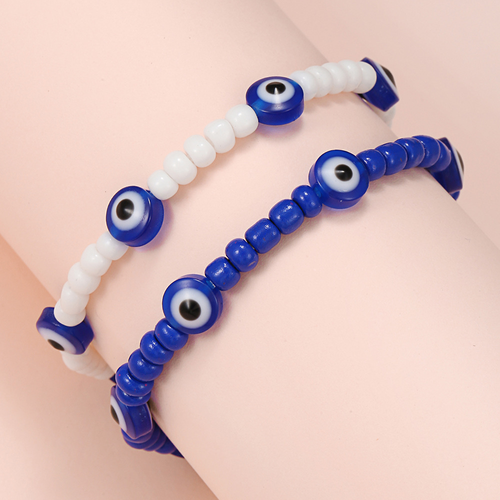 2Pcs/Set Evil Eyes bracelets Blue and White Rice Beads 2 elastic adjustable couple paper card bracelet set