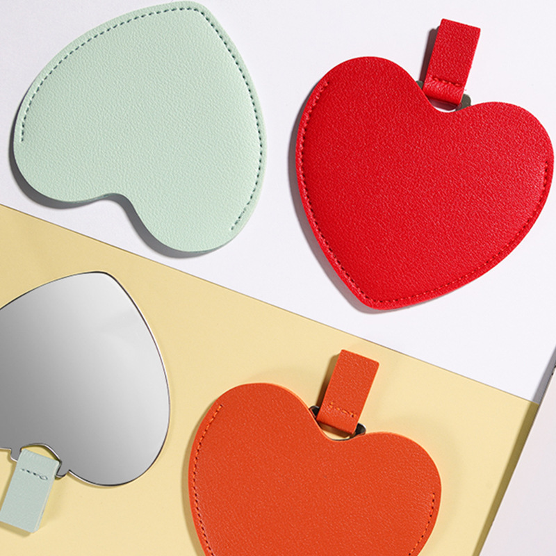 Custom Logo PU Heart Shape Makeup Mirror Portable Handheld Small Makeup Leather Pocket Mirror Stainless Steel Mirror