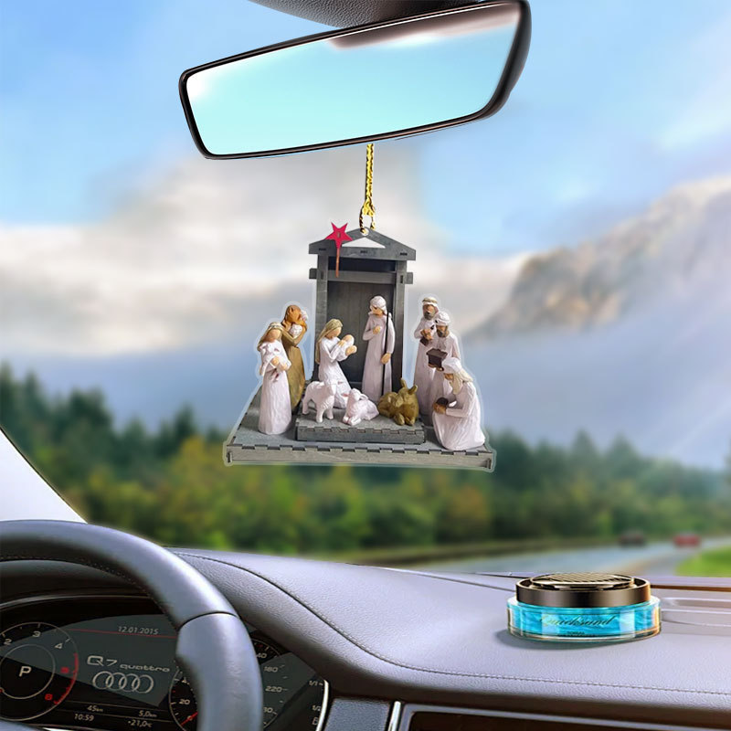 A 2D flat acrylic pendant with a statue of Jesus' birth scene is used to decorate your car, backpack, and keychain