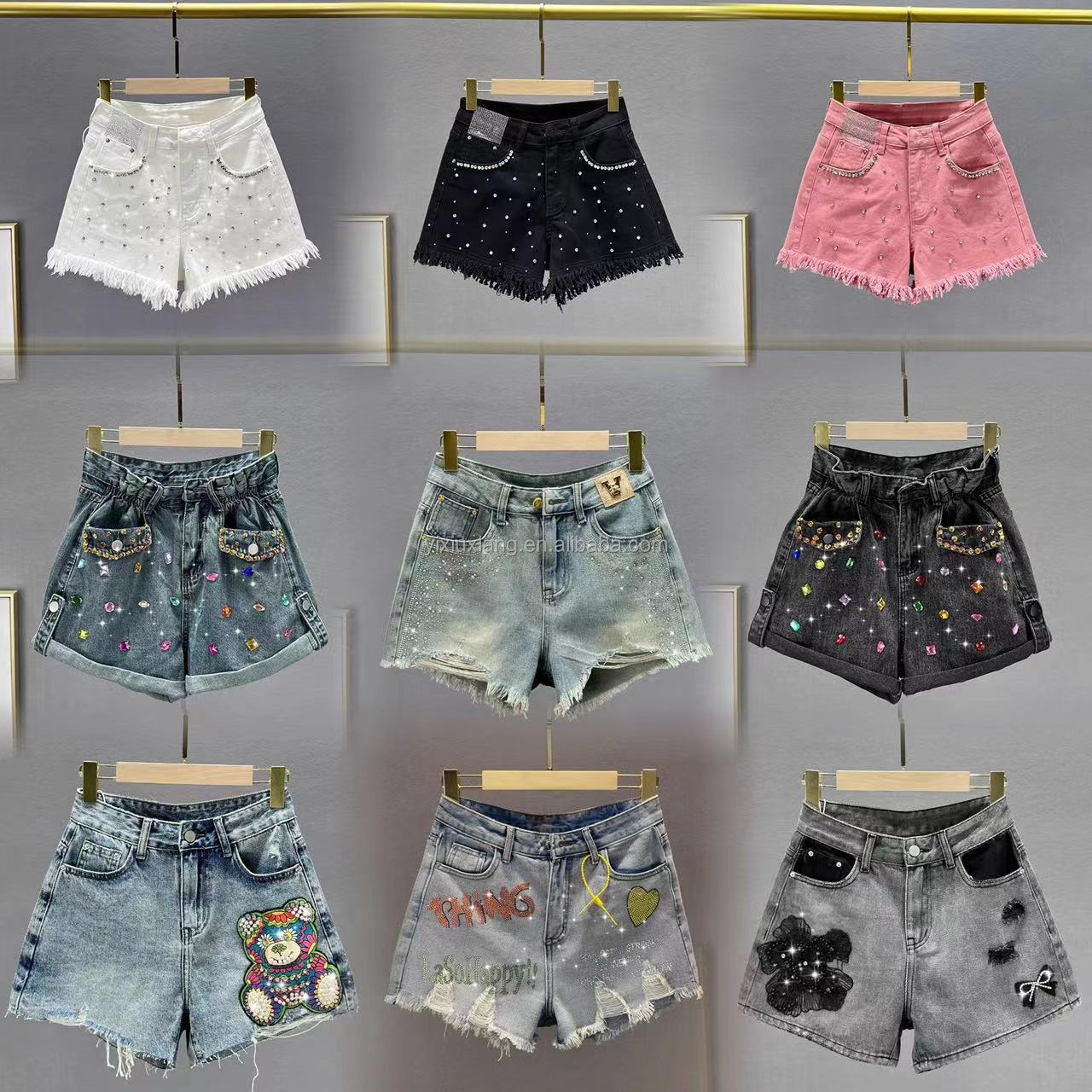 Wholesale women's short denim shorts with printed, split and tight styles