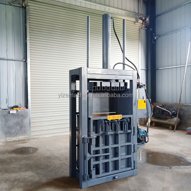 Vertical carton compress baler for used clothing wool Hydraulic metal pet bottle cardboard block baler baling press machine