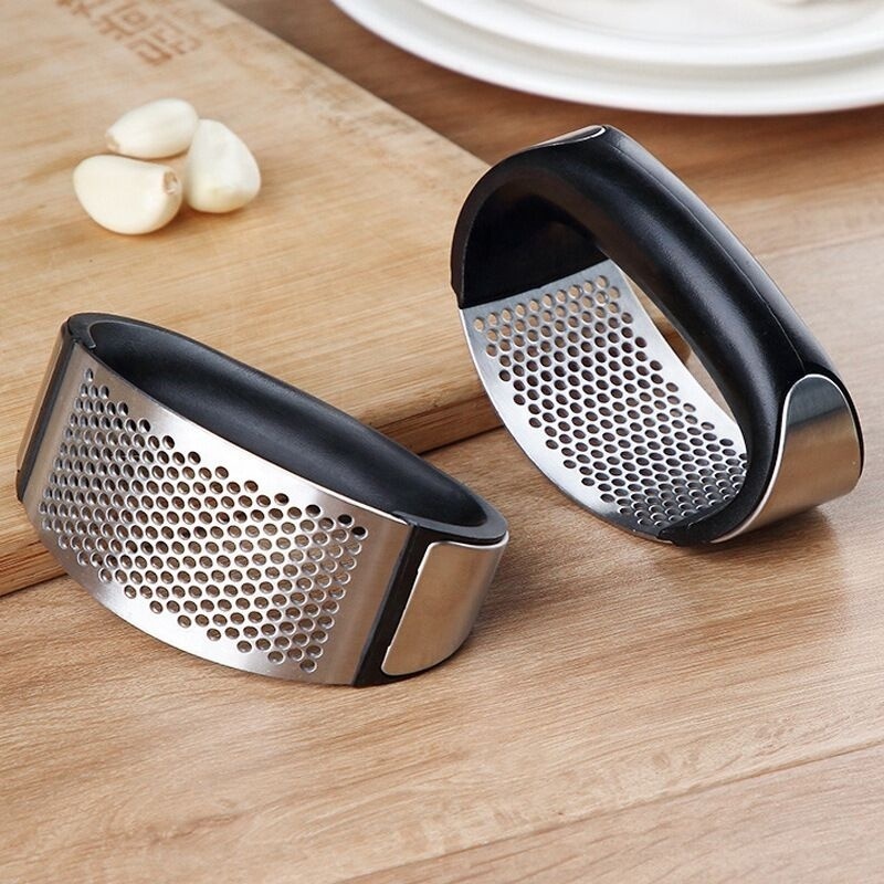 Kitchen portable 304 stainless steel black arc shape hollow-carved small handheld manual vegetable garlic chopper