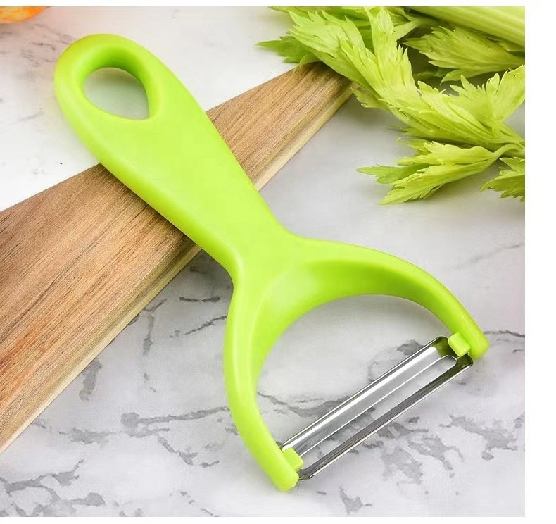 Kuhn Rikon Original Swiss Peeler, 4-Inch, Green Fruit and vegetable tool