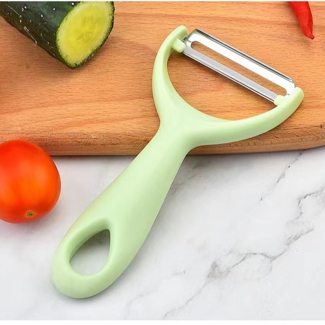 Kuhn Rikon Original Swiss Peeler, 4-Inch, Green Fruit and vegetable tool