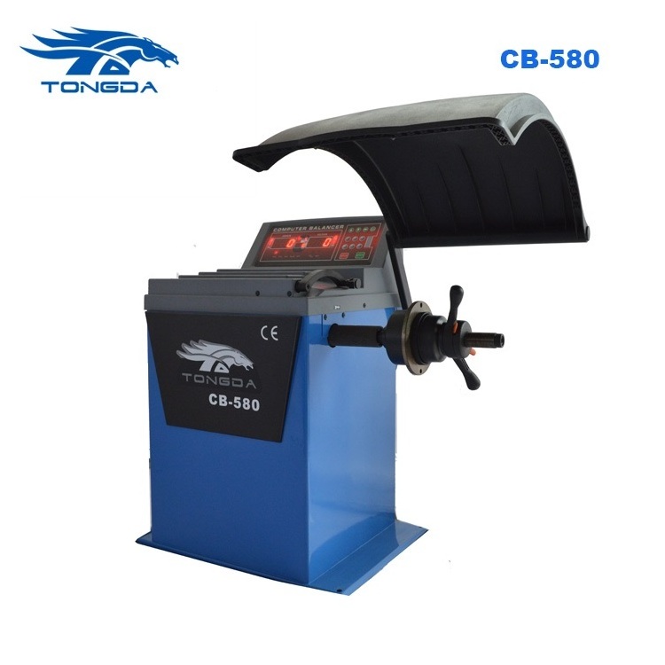 Tongda precision wheel balancer machine CB 580 CE Approved to get tires balanced wheel rotation and balance at home