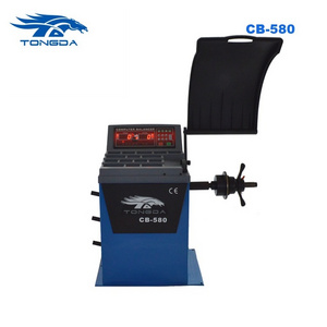 Tongda precision wheel balancer machine CB 580 CE Approved to get tires balanced wheel rotation and balance at home