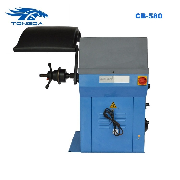 Tongda precision wheel balancer machine CB 580 CE Approved to get tires balanced wheel rotation and balance at home