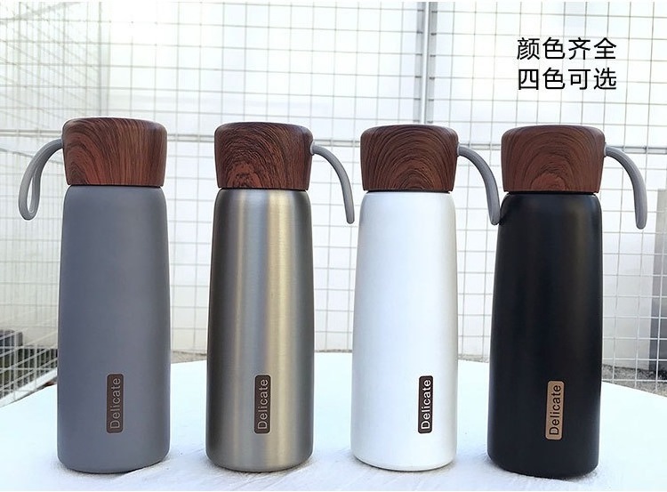 Manufacture 500ml bottle thermos custom logo double wall stainless steel drinking water bottle hot water bottle with wood cover