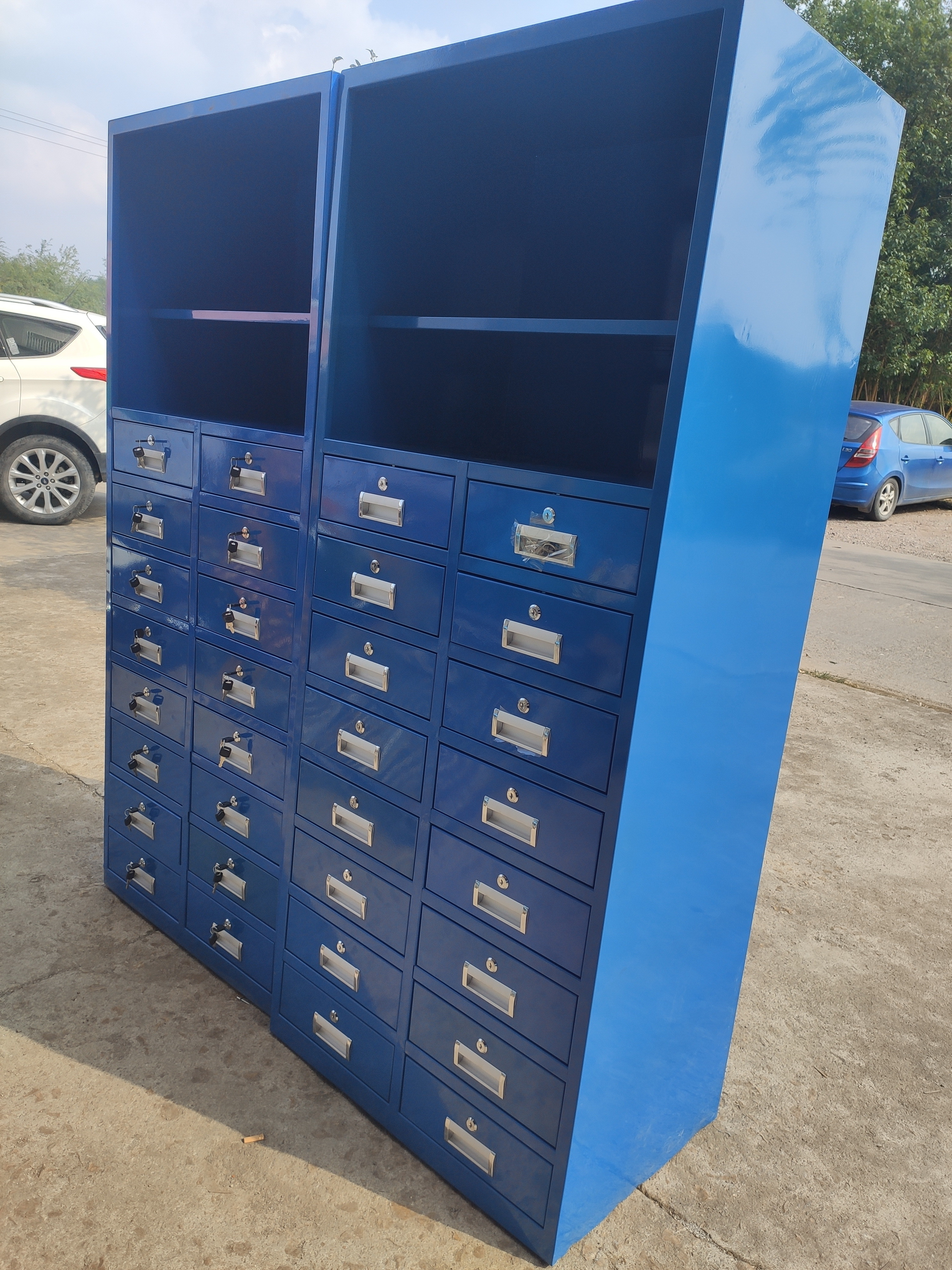 Metaltool chest and  tool cabinet with hook board used for workshop staff lockers